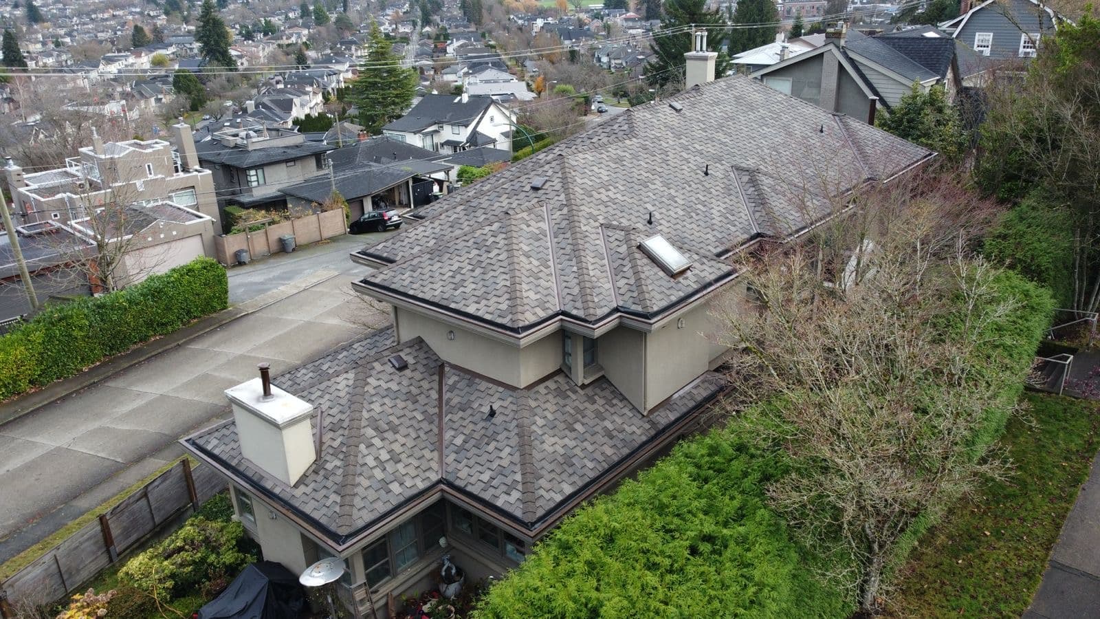 Residential roof replacement, grey shingles
