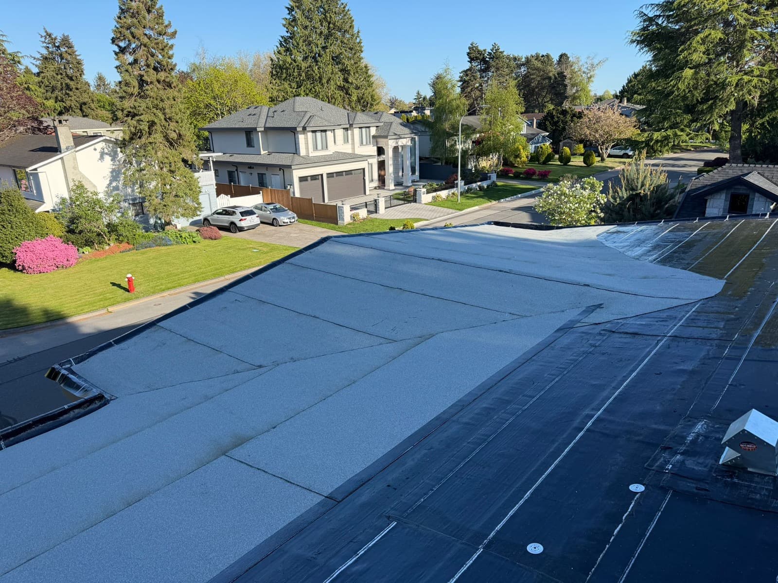New 2-ply flat roof system and dome skylight