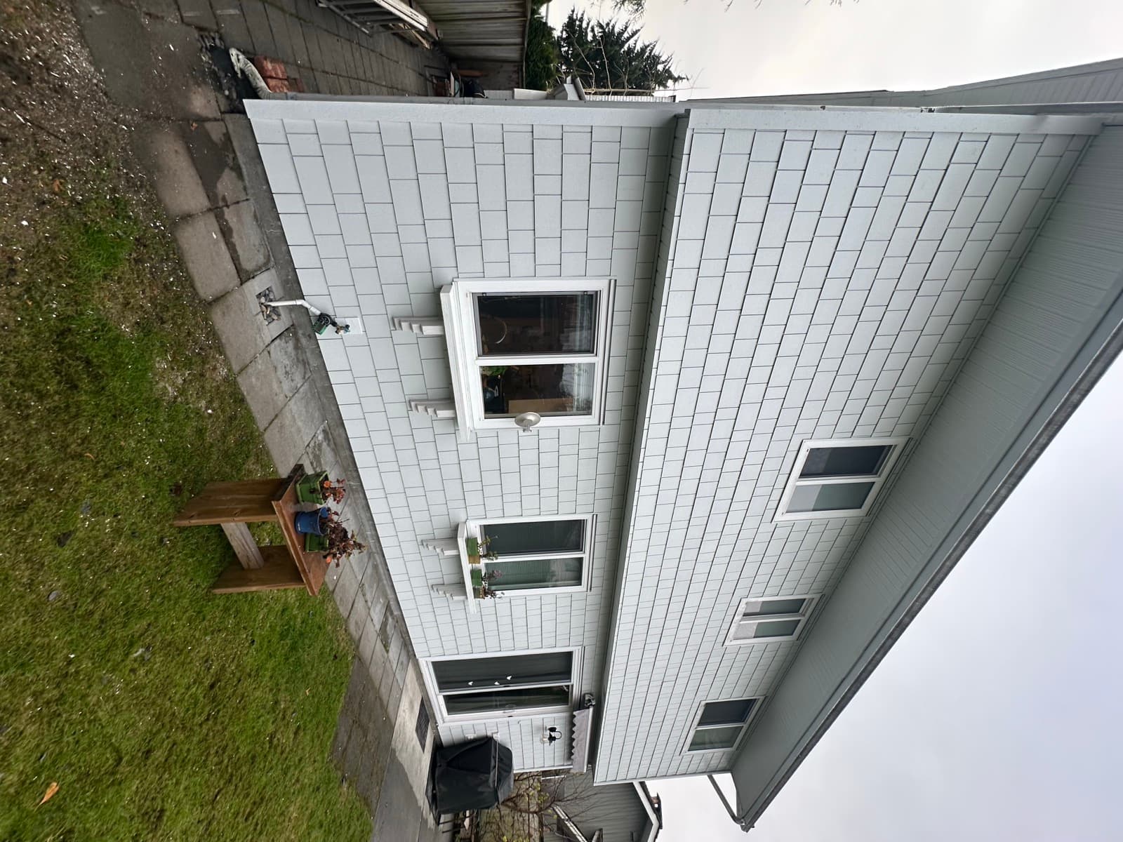 Completed white Hardishake siding