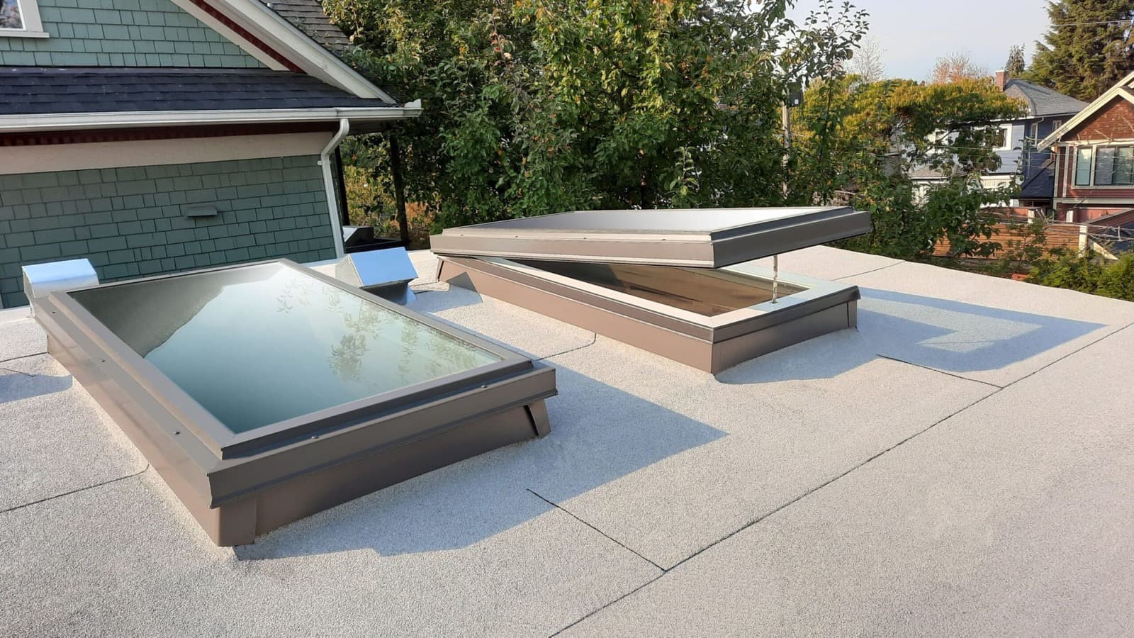 Flat skylights installed on flat roofing system