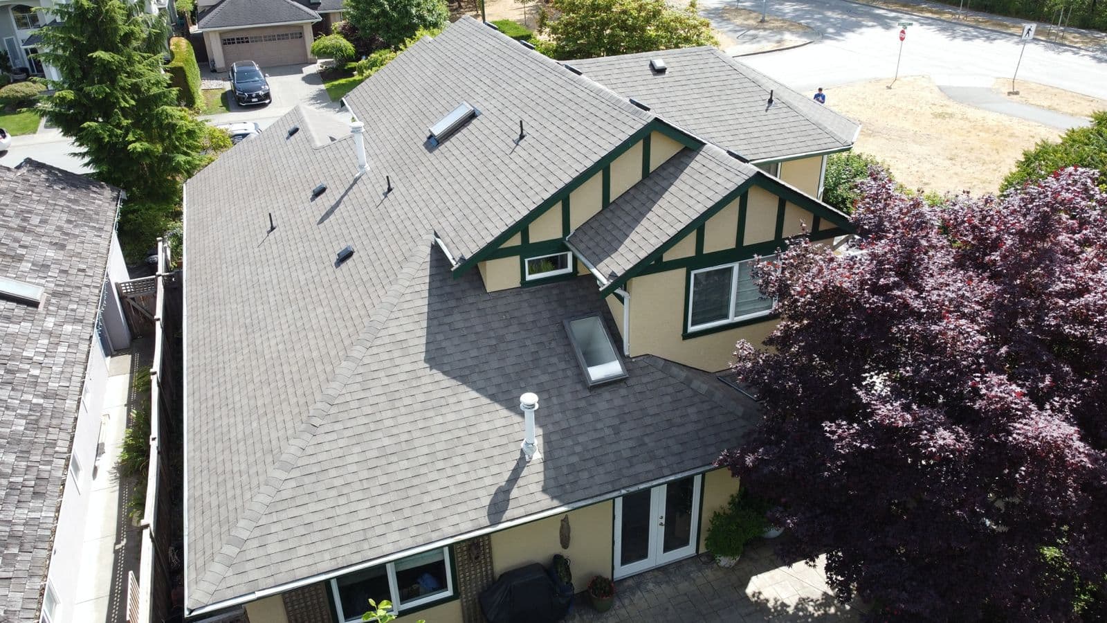 Completed skylights on asphalt shingle roof